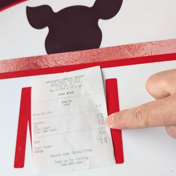 Carnitas Don Alberto - a hand holding a receipt - Mexican Near Me - Garden Grove, California Carnitas Don Alberto - a hand holding a receipt - Mexican Near Me - Garden Grove, California