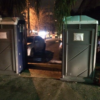 The Hideaway Bar - "restroom facilities" - porta potties which are located at the entrance to the parking lot, adjacent to the patio seating area. - Dive Bars Near Me - Orlando, Florida