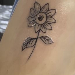 Sunflower tattoo by Mike