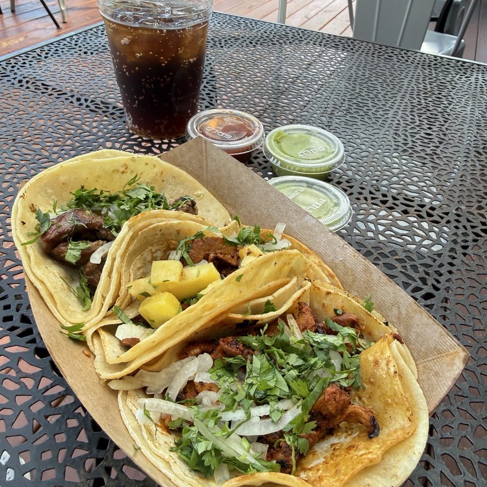 The Pollo al Carbon, Al Pastor and Carne Asada tacos The Pollo al Carbon, Al Pastor and Carne Asada tacos