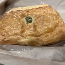 Flat Jalapeño Cream Cheese that looked nothing like the front display case one. Flat Jalapeño Cream Cheese that looked nothing like the front display case one.
