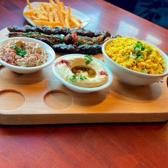Aladdin’s Shawarma - Grill mix with side of hummus, fries and baba ghanouj - Mediterranean Near Me - Greensboro, North Carolina