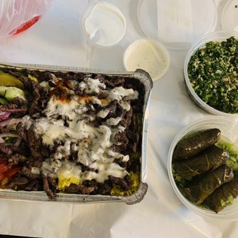 Halal Bros - Lamb Shawarma over Rice, Dolma, Tabouleh - Middle Eastern Near Me - Austin, Texas