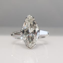 Claydon Jewelers - Marquise magic! Custom made vintage inspired marquise diamond 3 stone engagement ring with tapered baguettes!