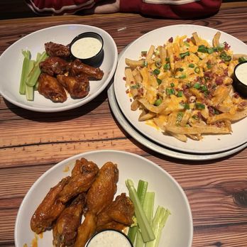 Miller's Ale House - 12 WINGS BUNDLE Mild and Honey BBQ  FULLY LOADED CHEESE FRIES - American Near Me - Orlando, Florida