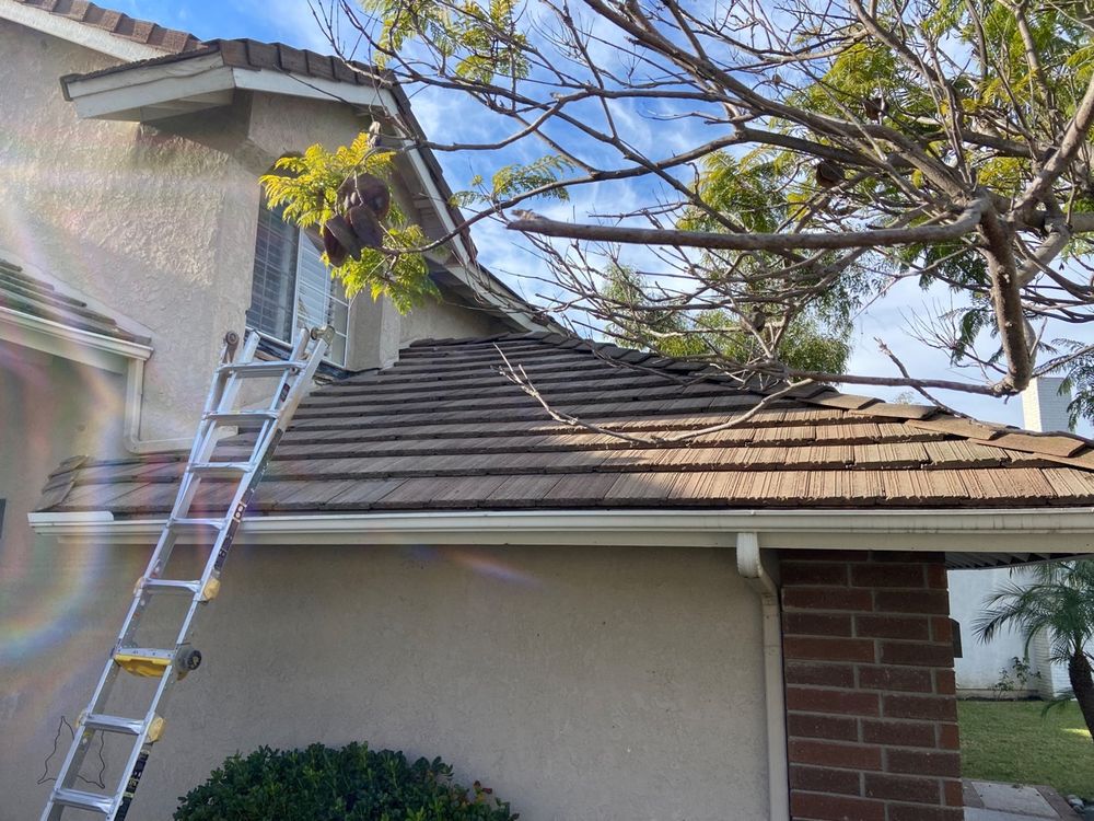 Slide of Green Leaf Roofers