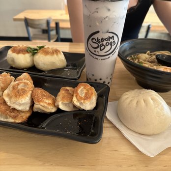 Steamboys - (Left to right, top to bottom) Seared Bao, Taro Boba, Seafood Noodle Soup, Seared Dumplings, Steamed Bao - Chinese Near Me - Hermitage, Tennessee Steamboys - (Left to right, top to bottom) Seared Bao, Taro Boba, Seafood Noodle Soup, Seared Dumplings, Steamed Bao - Chinese Near Me - Hermitage, Tennessee