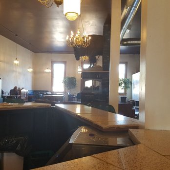 The Valkyrie - a view of a bar with a chandelier in the background - Wine Bars Near Me - Independence, Oregon The Valkyrie - a view of a bar with a chandelier in the background - Wine Bars Near Me - Independence, Oregon
