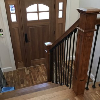 Alphacon - a view of a front door from the stairs - General Contractors Near Me