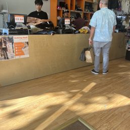 Both of these guys behind the counter need to be addressed.