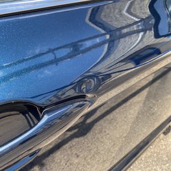Tidal Wave - This is the dent that the car wash caused and refused to pay for