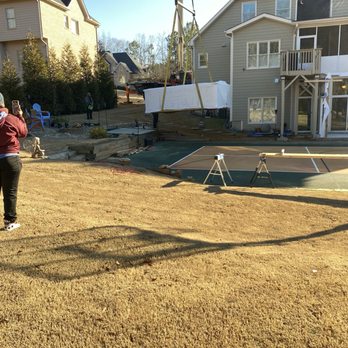 Patriot Lifting - Swim spa lowered in backyard - Crane Services Near Me Patriot Lifting - Swim spa lowered in backyard - Crane Services Near Me