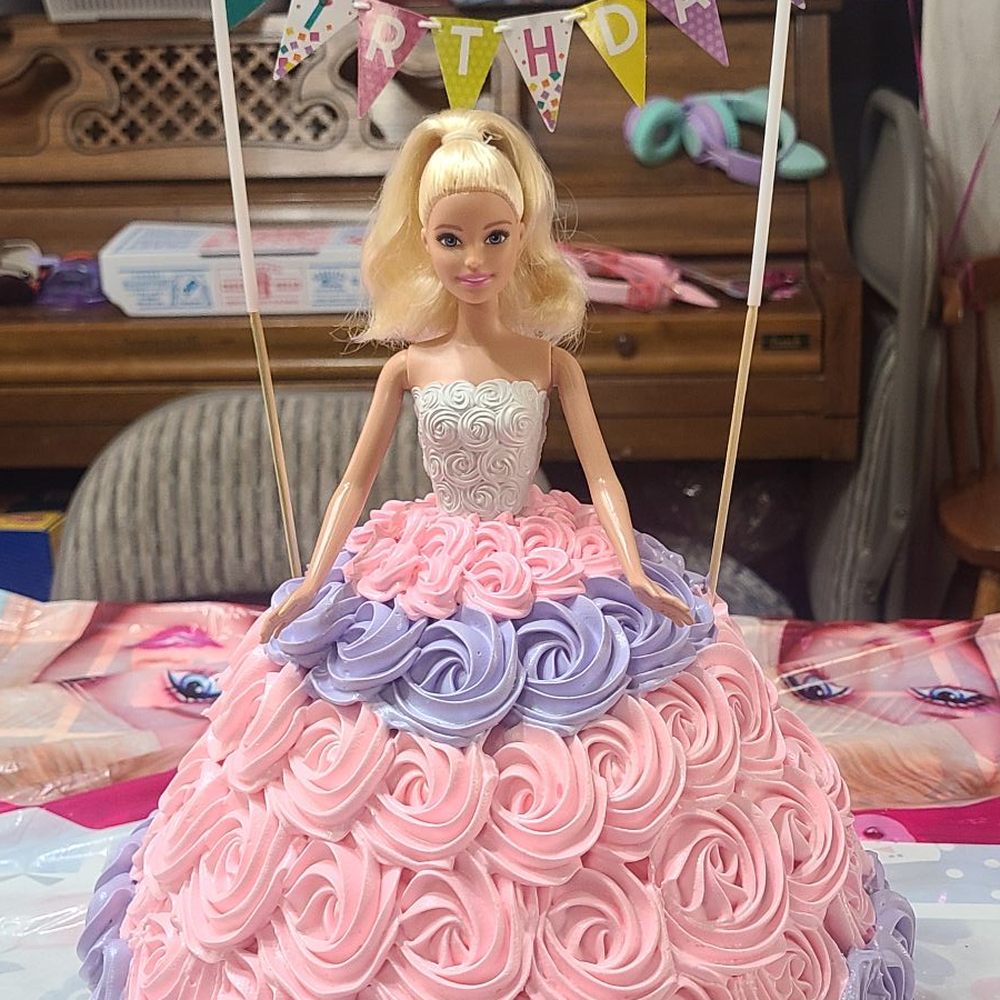 Barbie designed cake with strawberry filling.