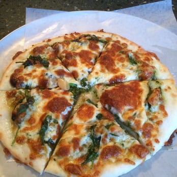The Joint Pizzaria & Deli - Gluten free spinach and garlic pizza with sundried tomato pesto sauce!! Heaven! - Pizza Near Me - Victoria, British Columbia