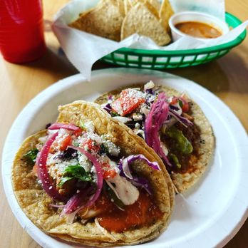 Tlaolli - Chipotle Chicken and Pork Asado tacos with homemade chips and salsa. - Mexican Near Me - Indianapolis, Indiana