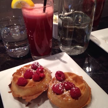 Stax Cafe - Cranberry-grapefruit juice and mini waffles topped with raspberries! - Breakfast & Brunch Near Me - Chicago, Illinois Stax Cafe - Cranberry-grapefruit juice and mini waffles topped with raspberries! - Breakfast & Brunch Near Me - Chicago, Illinois
