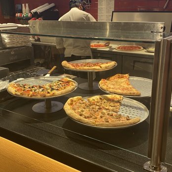 Sbarro - pizzas on display in a restaurant - Pizza Near Me - Mescalero, New Mexico