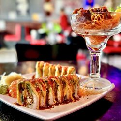 Khao Neow Sushi Thai Laos - "Lobster Roll" Tempura Lobster on top, lobster sushi roll on bottom sans the crème cheese.