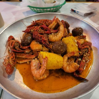 Surfing Crab - Daily special,  snow crab legs cluster,  crawfish,  headless shrimp. Cajun mild seasoning. - Cajun/Creole Near Me - San Antonio, Texas