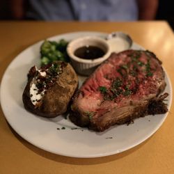 Clyde's Prime Rib Restaurant & Bar - Prime rib with broccoli and a loaded baked potato