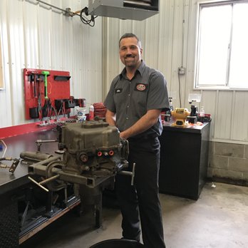 Quality Certified Transmission - Mike Root inspecting a rebuild. - Transmission Repair Near Me - Bloomington, Indiana