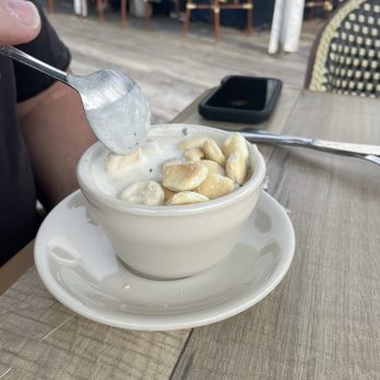 Arundel Wharf Restaurant - Clam chowder (hubby added oyster crackers before I could take a photo!) - Seafood Near Me - Kennebunkport, Maine