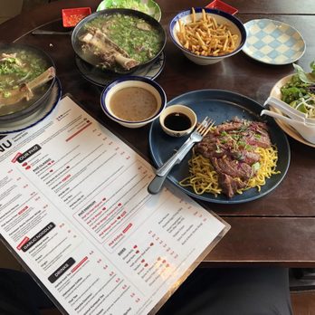 All About Pho - Fried egg rolls, fish sauce fries, garlic noodle prime ribeye steak and Phở Xe Lửa - Combination Phở - Vietnamese Near Me - Cerritos, California All About Pho - Fried egg rolls, fish sauce fries, garlic noodle prime ribeye steak and Phở Xe Lửa - Combination Phở - Vietnamese Near Me - Cerritos, California