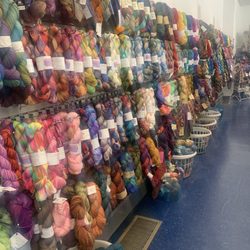Knit On! - Wall of yarn
