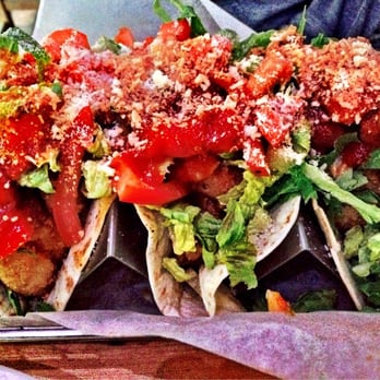 The Taurus - Fried Fish Tacos ( there's a lot of toppings) but the fish is under there I swear. - Bars Near Me - Miami, Florida The Taurus - Fried Fish Tacos ( there's a lot of toppings) but the fish is under there I swear. - Bars Near Me - Miami, Florida