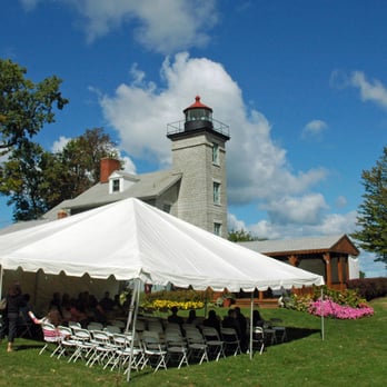 Lighthouse At Sodus Point - A wedding is about to begin by the Old Lighthouse in Sodus Point - Museums Near Me - Sodus Point, New York