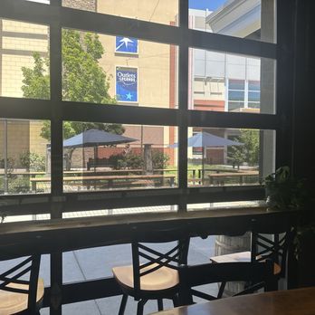 IMBĪB Custom Brews - Window seating with view of outdoor seating - Brewpubs Near Me - Sparks, Nevada