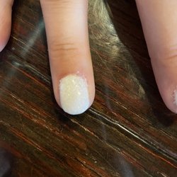 Hi-tek nails - Worst dip I've ever had.  Missed/super duper thick in spots & I have nail product all over. Do not spend money on this kind of service.