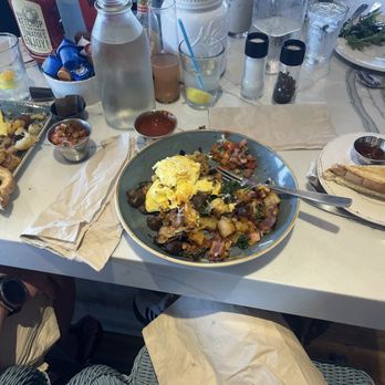 First Watch - Farmhouse omelette to the left, farmhouse skillet and delicious sourdough toast. - Breakfast & Brunch Near Me - Mesa, Arizona First Watch - Farmhouse omelette to the left, farmhouse skillet and delicious sourdough toast. - Breakfast & Brunch Near Me - Mesa, Arizona
