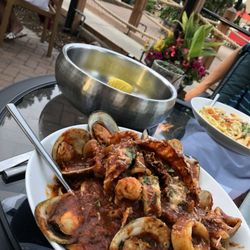 Seafood Diablo and Shrimp & Scallops over linguine - The owner is very involved, and the food is the very best!