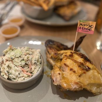 Nando's Peri-Peri - a plate of food - Chicken Shop Near Me - Addison, Texas Nando's Peri-Peri - a plate of food - Chicken Shop Near Me - Addison, Texas