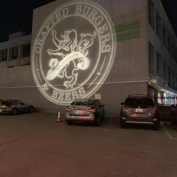 Morrison - Cool projection of their logo on the nearby building - Gastropubs Near Me - Los Angeles, California