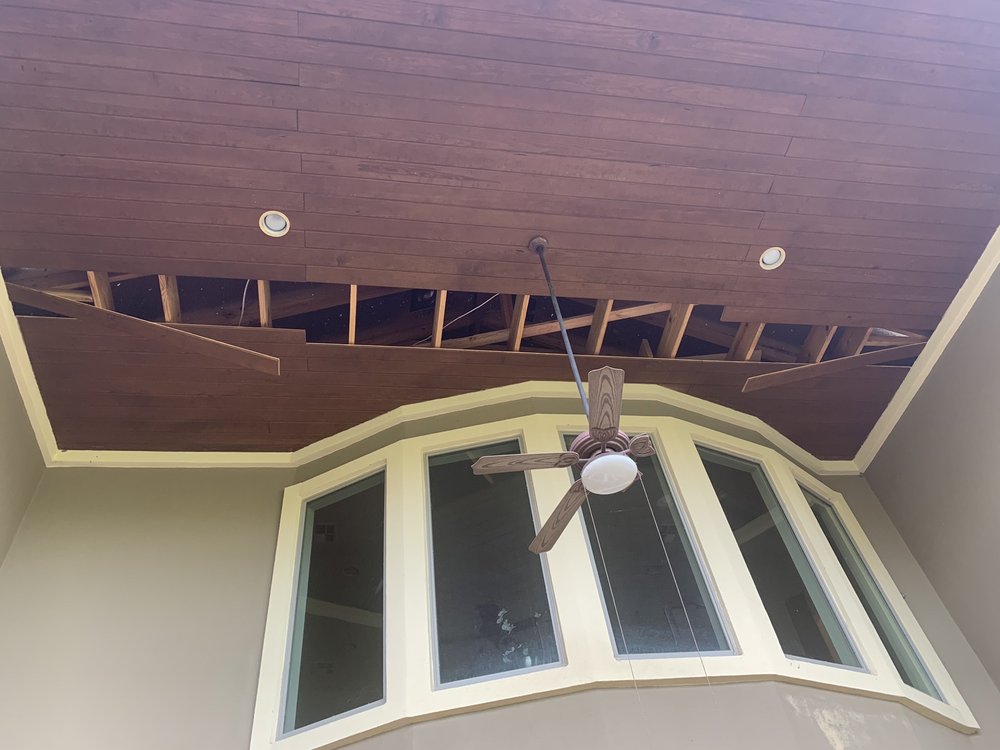 Slide of Freetail Roofing