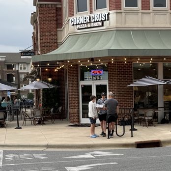 The Corner Crust - Entrance and Patio Seating - Pizza Near Me - Cornelius, North Carolina The Corner Crust - Entrance and Patio Seating - Pizza Near Me - Cornelius, North Carolina