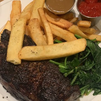 Stubrik's Steakhouse - 16 oz NY steak rare with sautéed spinach, fries and side of gravy. Never disappoints! - Steakhouses Near Me - Fullerton, California Stubrik's Steakhouse - 16 oz NY steak rare with sautéed spinach, fries and side of gravy. Never disappoints! - Steakhouses Near Me - Fullerton, California