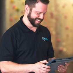 Anthem Technology - Kevin, the owner operator of Anthem installing a security system at inSpire Rock
