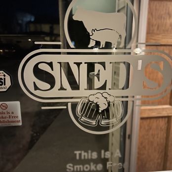 SNED'S - a glass door with a sign on it - Burgers Near Me - New Castle, Indiana SNED'S - a glass door with a sign on it - Burgers Near Me - New Castle, Indiana
