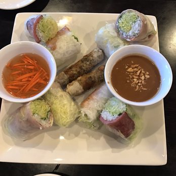 Miss Saigon - The number 9 appetizer with a bunch of different spring rolls, a great way to try new things. Two different sauces for dipping. - Vietnamese Near Me - Tucson, Arizona Miss Saigon - The number 9 appetizer with a bunch of different spring rolls, a great way to try new things. Two different sauces for dipping. - Vietnamese Near Me - Tucson, Arizona