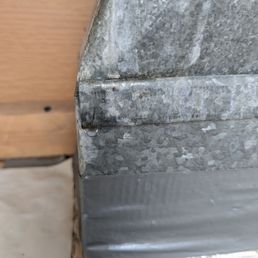 Water dripping from the roof around our hood vent. Water dripping from the roof around our hood vent.