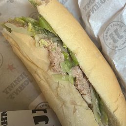 a sub sandwich in a wrapper