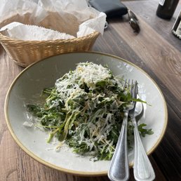 Artichoke and arugula salad with pine nuts and lemon. This salad is made with shaved RAW artichokes. It is so fresh and bright. Artichoke and arugula salad with pine nuts and lemon. This salad is made with shaved RAW artichokes. It is so fresh and bright.
