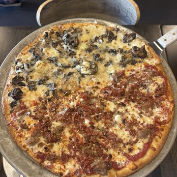 Blue Line Pizza - half wild mushroom and half chicago chop on thin crust - Pizza Near Me - Mountain View, California Blue Line Pizza - half wild mushroom and half chicago chop on thin crust - Pizza Near Me - Mountain View, California
