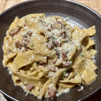 Rediviva - Pappardelle carbonara: handmade pasta, wild boar bacon, confit garlic, black pepper, egg yolks, pecorino Romano, herbs. - New American Near Me - Aberdeen, Washington Rediviva - Pappardelle carbonara: handmade pasta, wild boar bacon, confit garlic, black pepper, egg yolks, pecorino Romano, herbs. - New American Near Me - Aberdeen, Washington