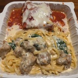 Half chicken Alfredo and half lasagna Half chicken Alfredo and half lasagna
