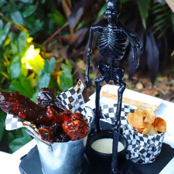 Barton G - Bucket of bones with 12 hours ribs - New American Near Me - Miami Beach, Florida