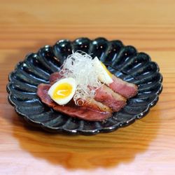 Duck tataki -- seared duck served medium rare.